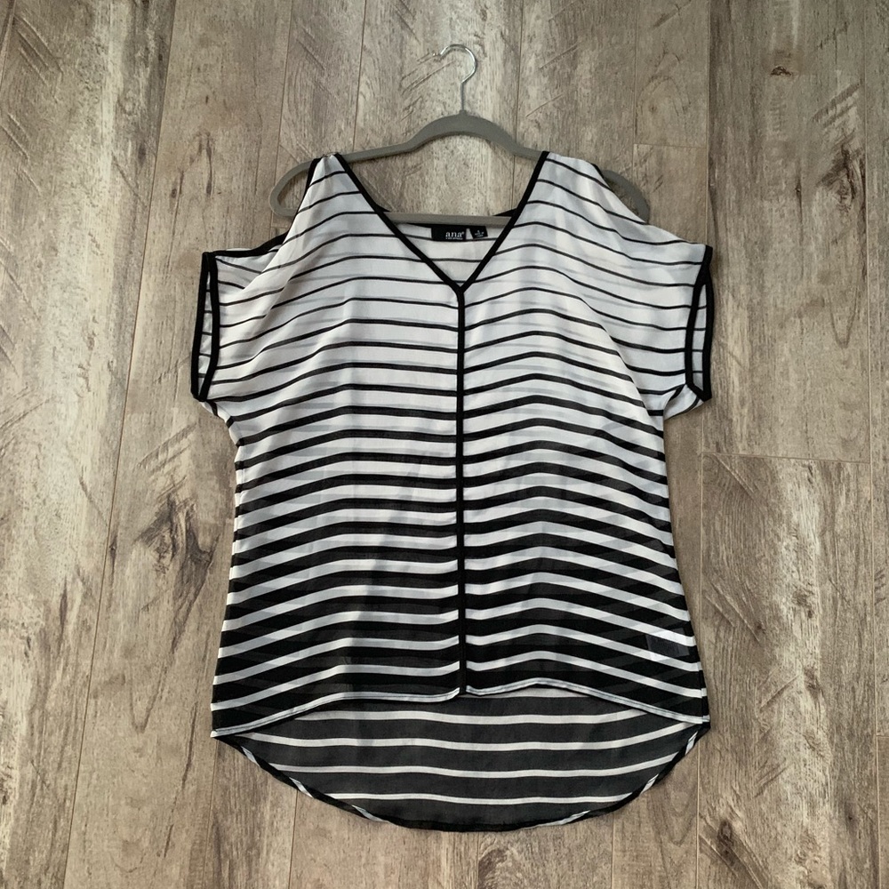 Black and white like new high low top.